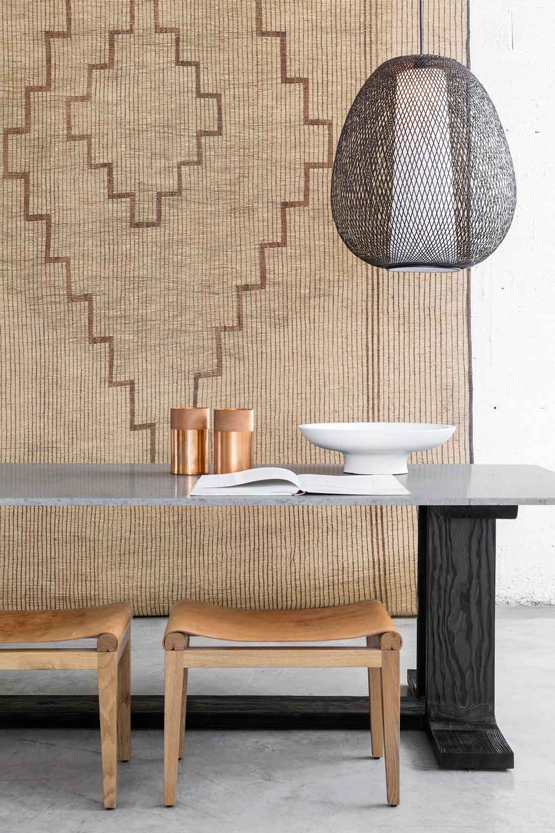 stylish chic tribal carpet hung on wall