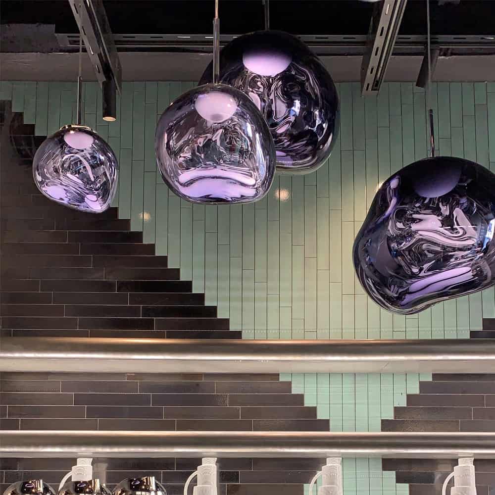 Dixon Lights in purple over turquise wall cover in The Manzoni restaurant in Milan Design week 2019